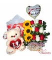 Canasta con flores varias y peluche