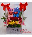 Caja con flores y peluches